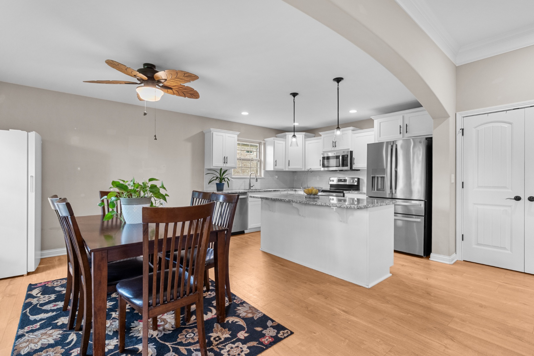 Dining area opening to kitchen